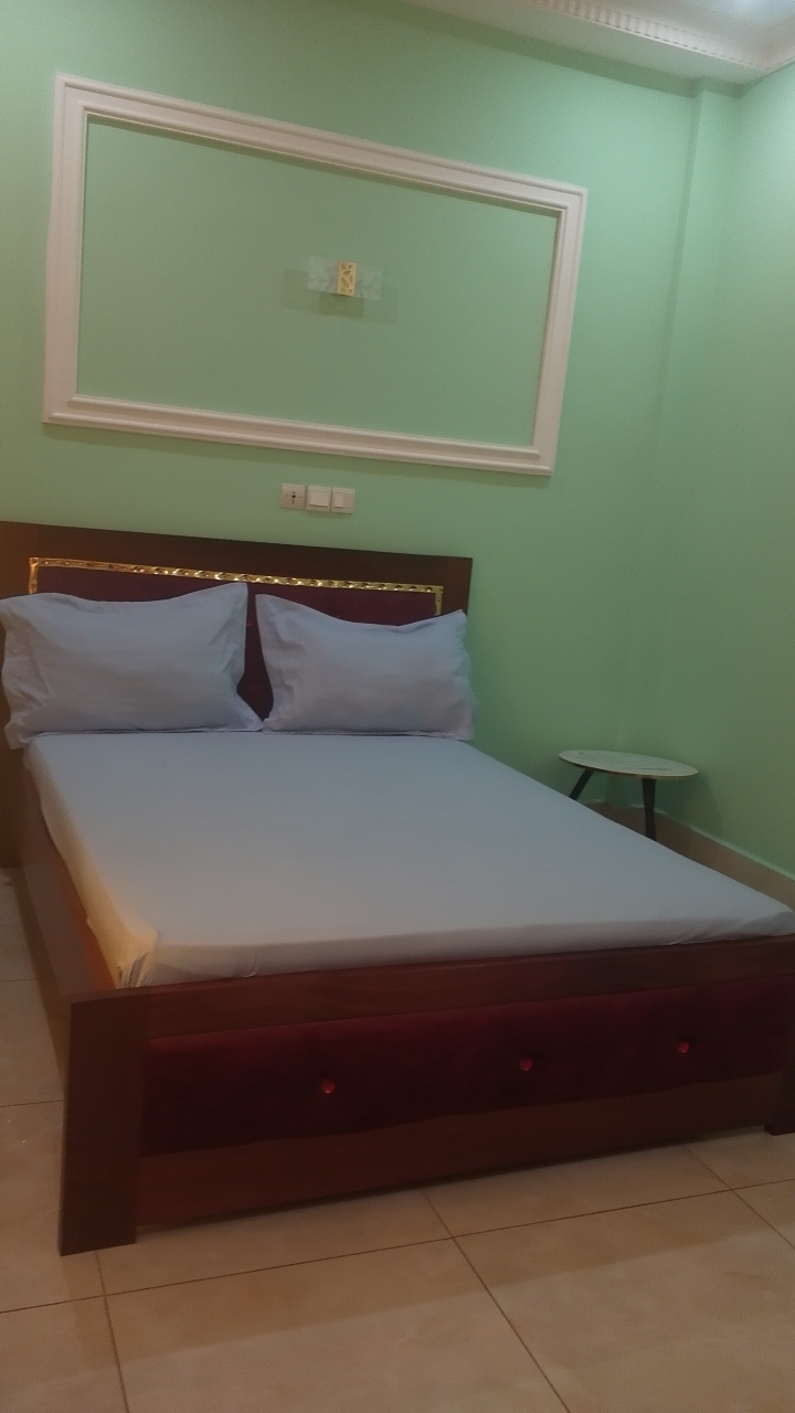 Chambre simple, tons verts apaisants